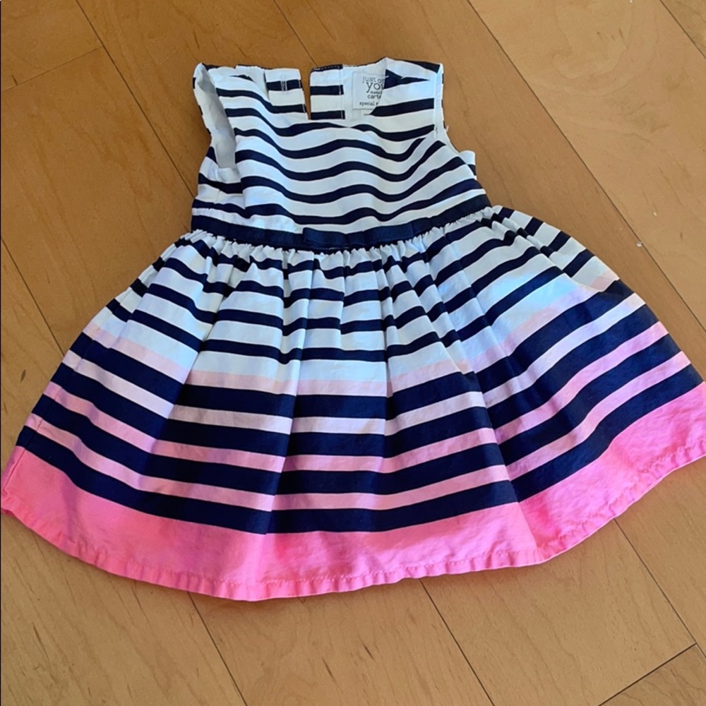 White dress with blue and pink strips